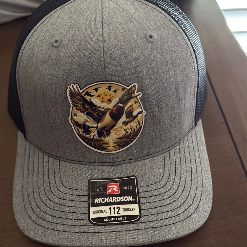 Centennial supply Company Gray and Black Trucker Hat
